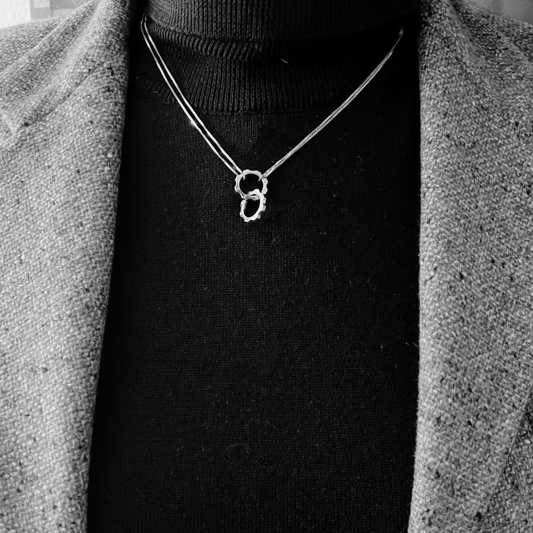 Collana versatile con catena veneziana light e due mini ingranaggi argento