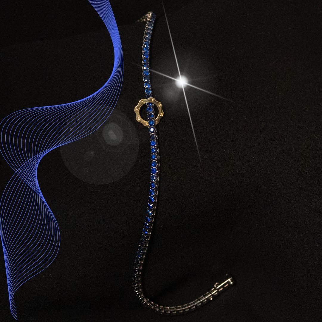 Bracciale tennis zaffiri blu e oro bianco