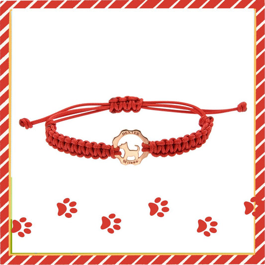 Bracciale oro rosa sagoma del cane e filo nautico rosso
