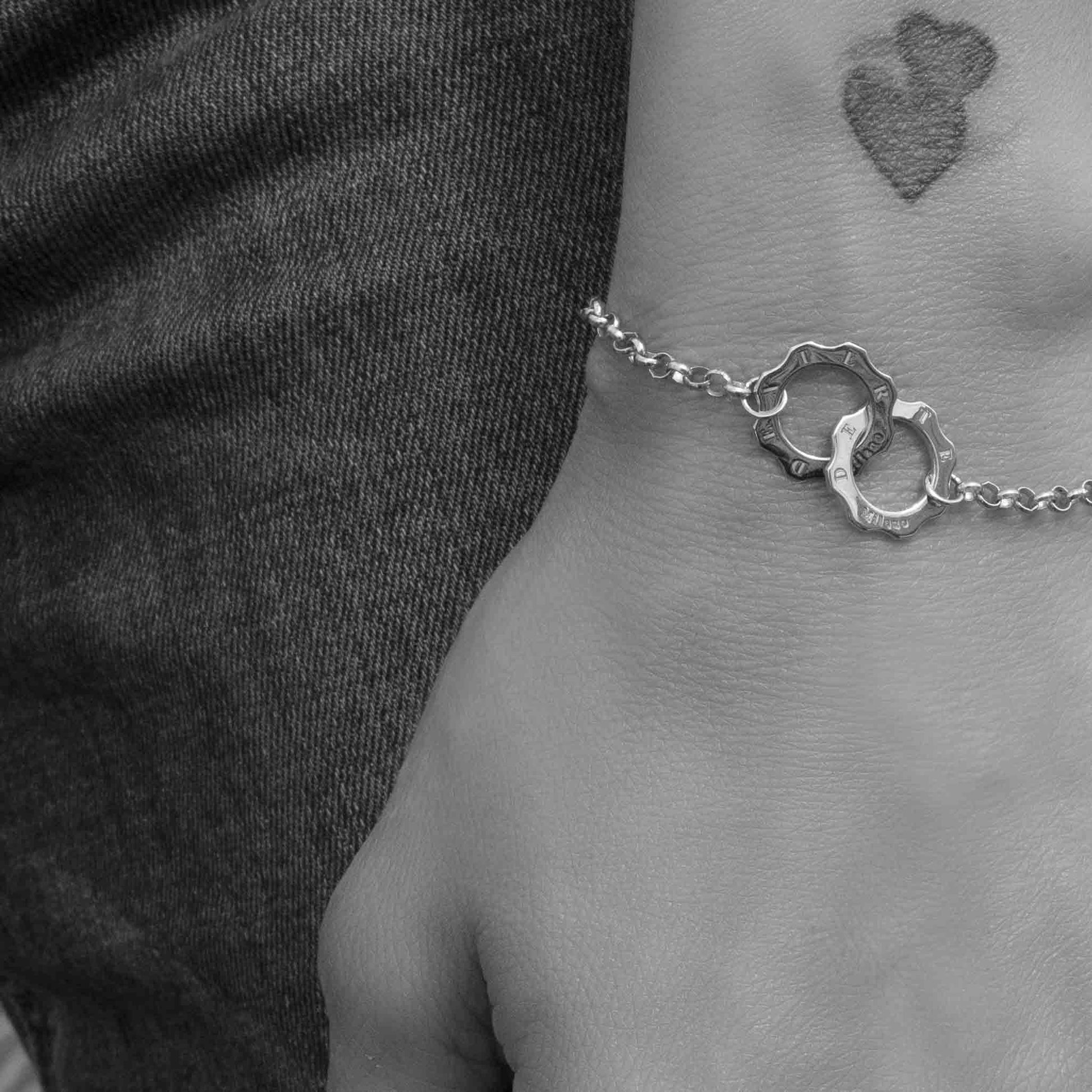 Silver union bracelet worn