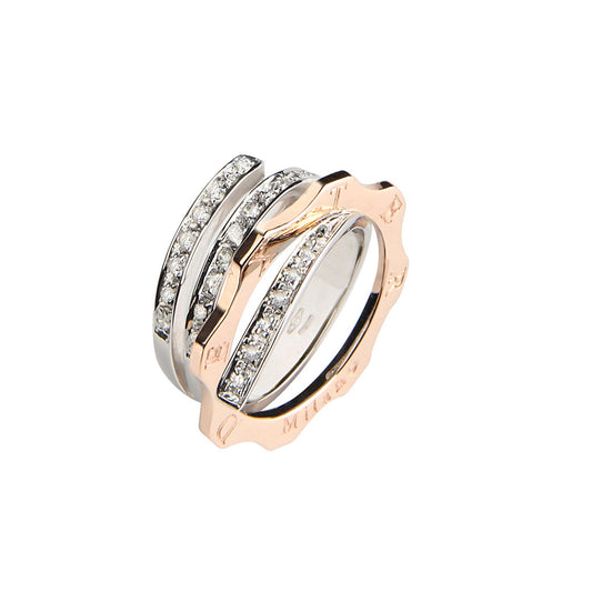 Anello Curl oro bianco e giallo con brillanti