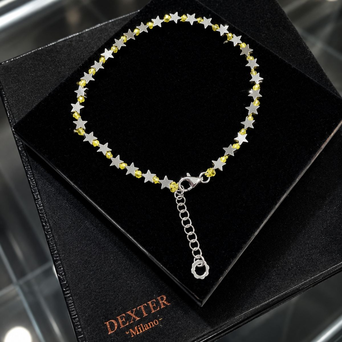 Cavigliera con pietra ematite a stella filo nautico giallo fluo