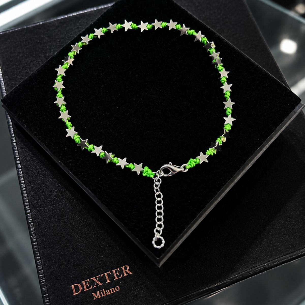 Cavigliera con pietra ematite a stella filo nautico verde fluo
